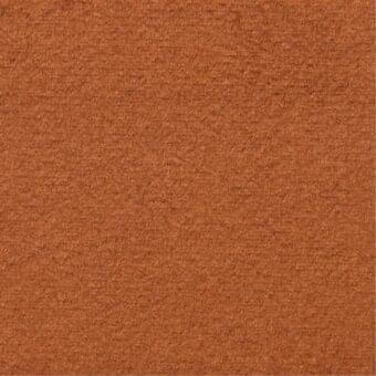 Terracotta fabric texture displaying a dense, granular weave with mottled tonal variations and a consistent, solid color throughout the sample.